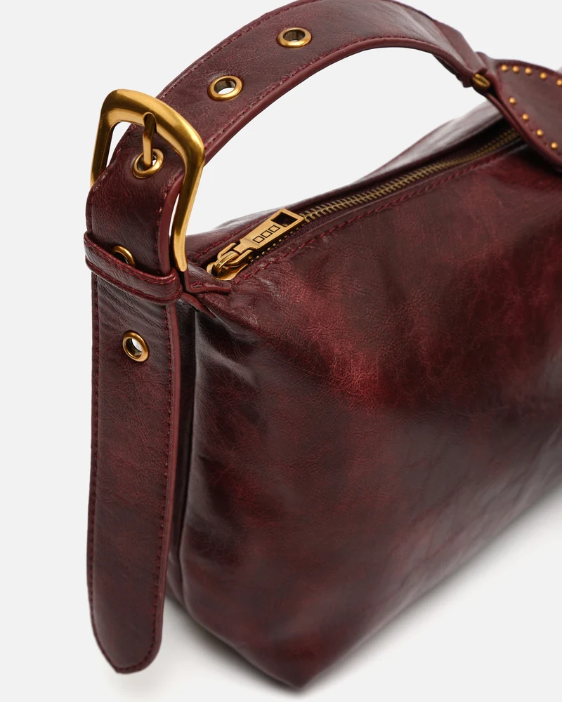 Gosti bolso bandolera pequeño con detalles metálicos