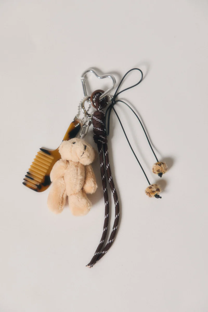 Charm oso de peluche beige