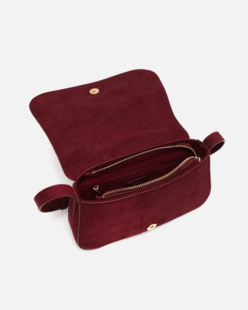 Nemu bolso bandolera pequeño efecto ante con detalles metálicos grandes