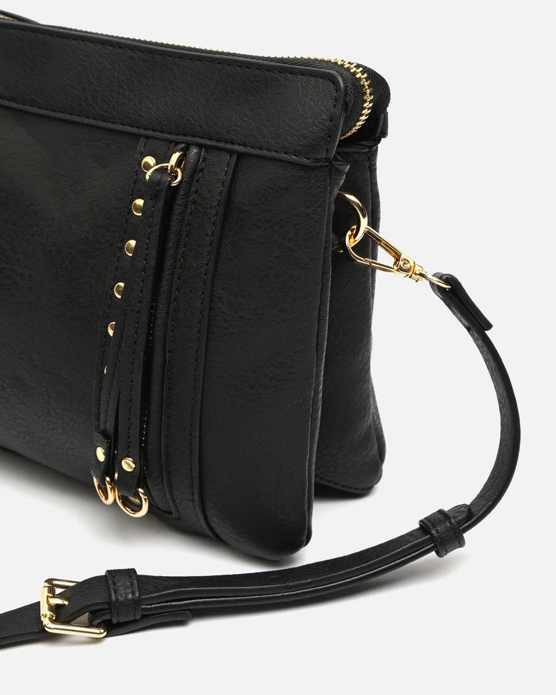 Nikasi bolso bandolera con detalles metálicos