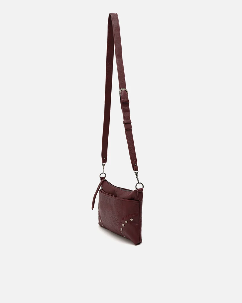 Sereny bolso bandolera pequeño con detalles metálicos