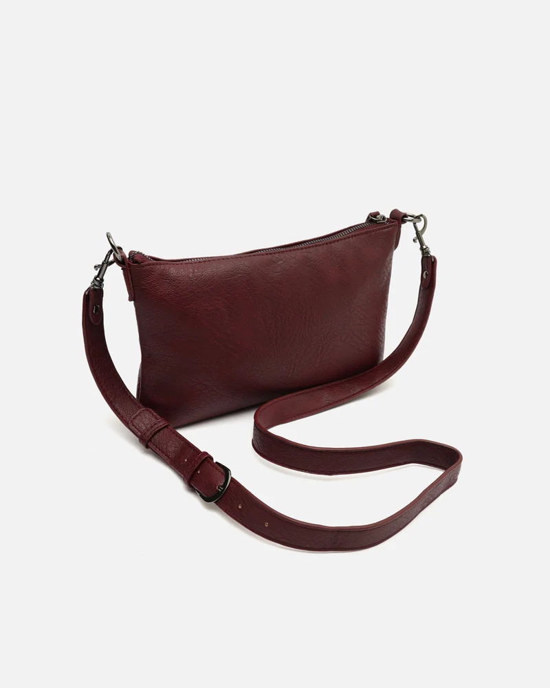 Sereny bolso bandolera pequeño con detalles metálicos