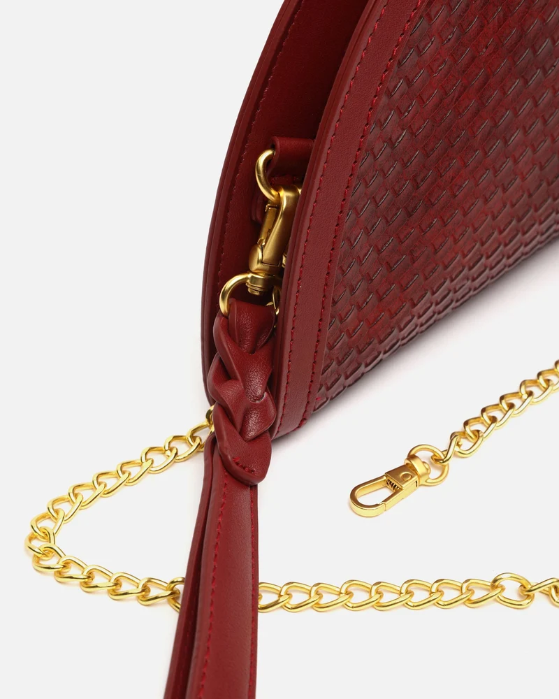 Empadi bolso de fiesta en media luna trenzado con asa bandolera extraíble ED.