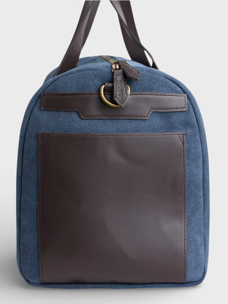 Bolsa de viaje detalle piel azul marino