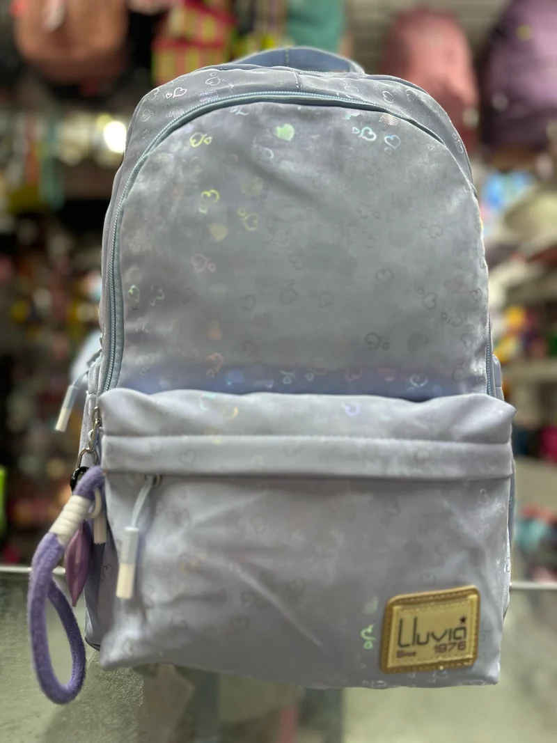 Mochila juvenil corazones tornasol azul lluvia